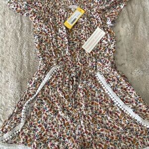 Girls brand new floral shirt romper